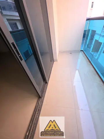 A spacious one-bedroom apartment with a balcony in the Al Hamidiya area, near the Ajman Court and University, close to all services and main roads.