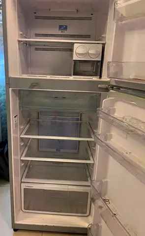 Used double-door refrigerator, working condition, slight repair required