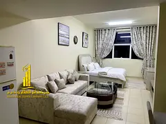 Furnished semi-detached kitchen studio with very high-end furniture for monthly rent in Ajman - Al R