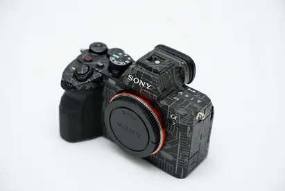 Sony Alpha A74 mirrorless camera (body only) with custom skin - Very Good condition