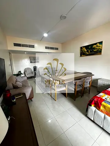 Furnished Apartment for Annual Rent in Ajman - Horizon Towers | 2BR + Living | 3 Bathrooms | Balcony Open View | Free Parking | AED 45,000