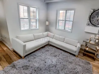 Off white cream color crate and barrel corner sofa