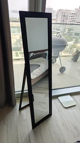 Full length standing mirror with black frame