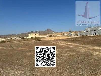 🏔️ صفقة استثمارية وسكنية لا تُفوّت في أحضان الطبيعة! | أرض للبيع في مصفوت – حوض 1 (إمارة عجمان) 🏔️