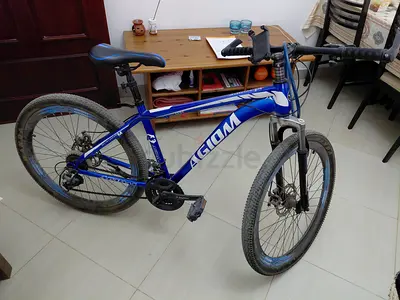 Used blue 26" Woom mountain bike - good condition