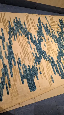 Beige Rug with Blue Abstract Pattern - Good Condition