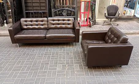 Brown leather 3-seater sofa and matching armchair - good condition
