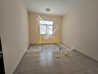 شقه غرفتين وصاله بمنطقة القليعه الشارقه تكييف مركزي بلكون اطلاله مفتوحه مساحات واسعه صيانه مجانيه باركن متوفر تسهيلات بالسداد