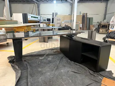 Modern black glass executive office desk with storage unit