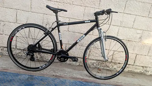 Gios hybrid commuter bike - alloy frame, 21-speed, front suspension