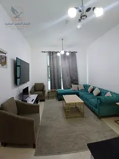 Luxury onebedroom apartment for rent in Ajman City Towers with a spacious balcony modern furniture a