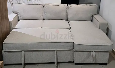Light beige colour L-shaped corner sofa Bed with chaise - good condition