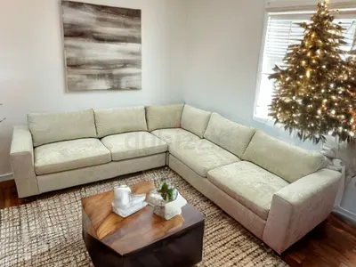 Pottery Barn beige color corner sofa
