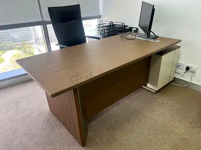 Office desk, chair, and storage cabinet