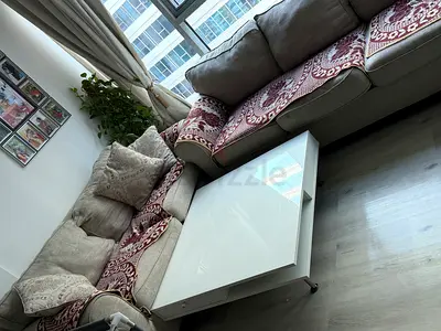 L-shaped Fabric Sofa with Glass-top Coffee Table - Good Condition