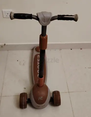 Kids three wheel push scooter brown good condition