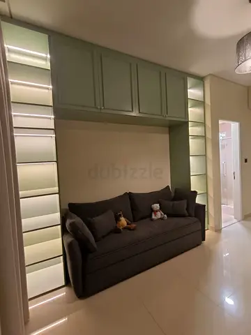 Built-in Shelving Unit with Overhead Cabinets and Daybed - Modern, Lighted