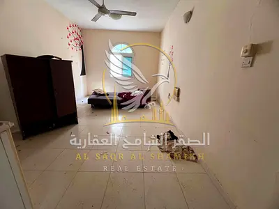 استوديو بمساحة كبيرة بالناصرية مساحة واسعة وتكييف مركزي في بناية عائلي في منطقة حيوية ومطلوبة