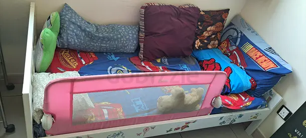 Toddler Bed with Pink Safety Bed Rail and mattress