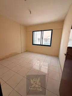 Annual apartment for rent in Al Majaz 1 for bachelors Three bedrooms living room and three bathrooms