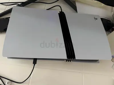 PlayStation 5 Pro UAE- like new use 1 month only - Samsung monitor G7 (2K) - 1 year PS Subscription