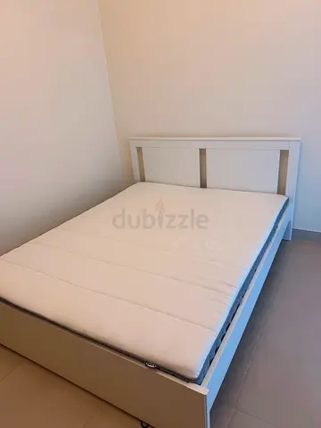 Queen-size bed + mattress from IKEA