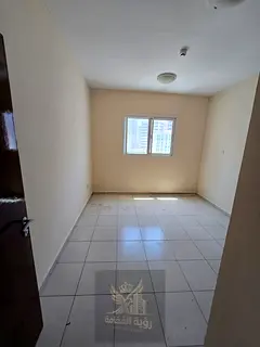For rent in Al Majaz 3 Sharjah one bedroom apartment with living room balcony and built in wardrobes