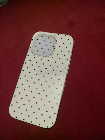IPhone 14 pro White polka dot protective phone case ( brought it mistake if any one needs contact)