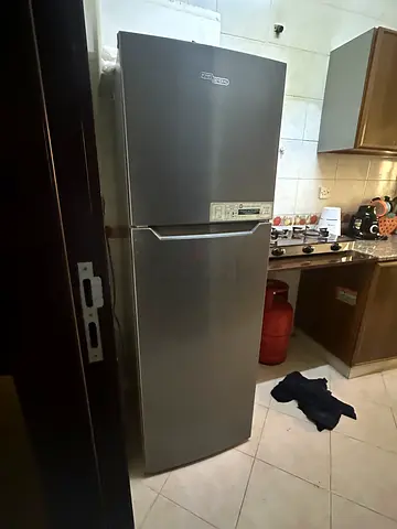 Silver double-door refrigerator, good working condition