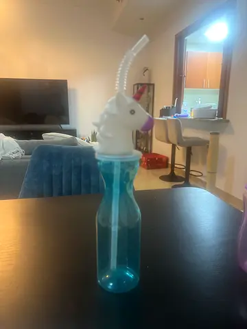 Used Blue bottle with the straw and Unicorn design