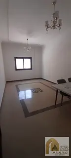 Two-bedroom apartment for annual rent in Al Khan, Sharjah | Open rear view | Balcony | Built-in ward