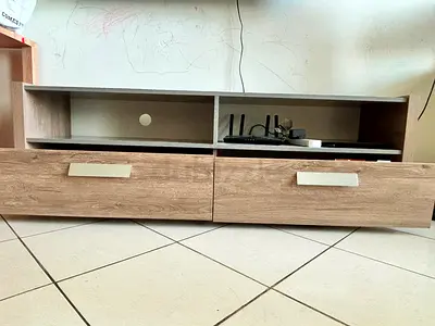 Low wooden TV stand with drawers - light oak finish