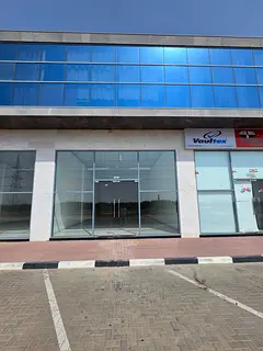 Direct from Owner Main road Showroom with High Glass frontage in New Sajaa/Emirates Industrial City