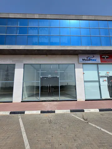 Direct from Owner Main road Showroom with High Glass frontage in New Sajaa/Emirates Industrial City
