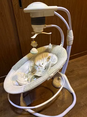 Jikel Baby swing with mobile and recline — gently used