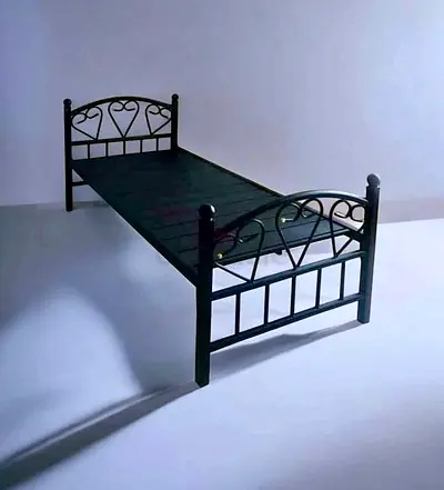 Single metal bed frame with decorative head & footboard - good condition
