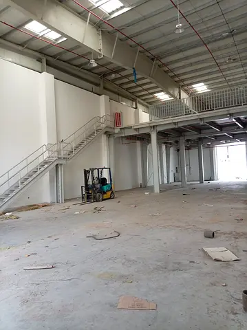 8,000 sqft Warehouse | 5,300 Ground + 2,700 Mezzanine | 40 kW Power | Offices + Bathrooms + Kitchen | Umm Al Thaoub, Umm Al Quwain | AED 220,000 Yearl