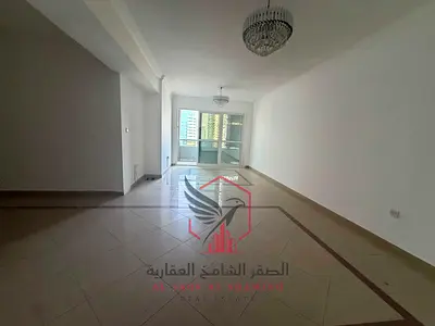 Sea view with balcony and parking, two-bedroom apartment with a larg and modern finishing for annual rent in the most beautiful towers of Sharja