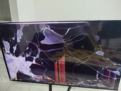 Broken 65-inch LED TV screen - for parts or repair