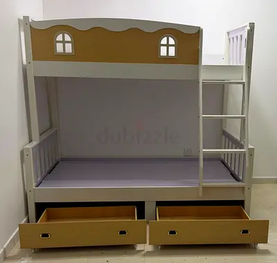 Wooden kids bunk bed with storage drawers - good condition
