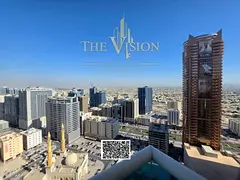 Two bedrooms and a living room with parking, city views, high floor, spacious layout