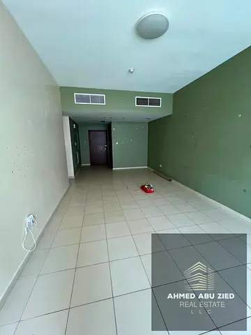 Luxury 3BR hall in Ajman One Towers, 3 master rooms, maid and laundry rooms, 5 baths, balcony, full facilities, AED 65,000 yearly, 4 payments, securit