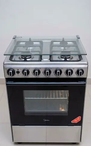 4-burner Gas Stove with Oven - Midea, Good Condition