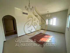 One bedroom and living room apartment in Al Butinah with a hallway and balcony, air conditioning, an