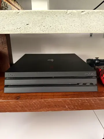 PS4 Pro 1TB Bundle — 4 Controllers + 8 Games + Original Box