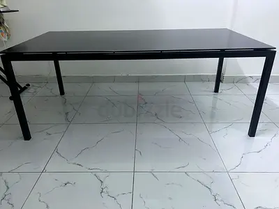 A Strong Black Mirror Dining Table
