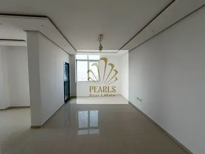 2BR for annual rent in Al Nuaimiya 3, near Verona Roundabout, in a premium tower with excellent finishing, 2 bathrooms, open-view balcony, spacious ki