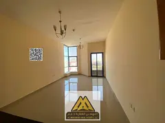 Studio apartment for annual rent in Al Nuaimiya Tower C, in a prime location with a balcony, free pa