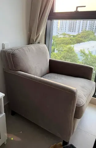 Comfortable single-seater gray fabric armchair - good condition