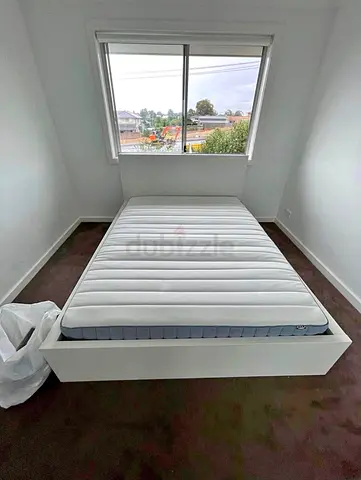 IKEA king bed frame with IKEA mattress